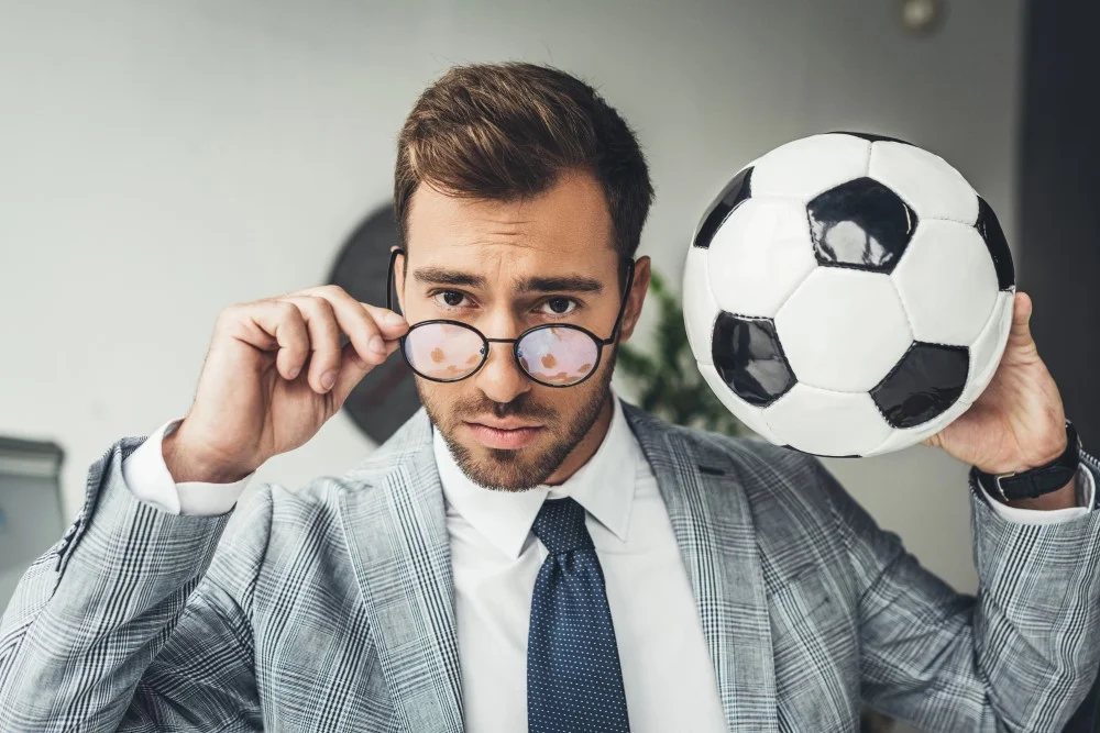 Mentaltræner med fodbold